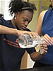 Derenique Barnes, a KSC participant conducts a forensic experiment at Syracuse University